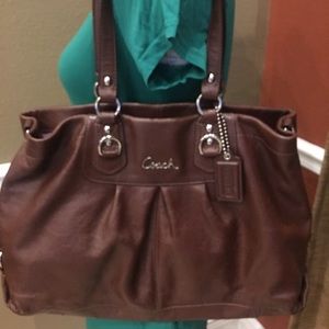Brown Coach purse.